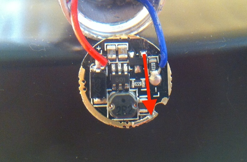 Arrow showing new bypass trace to be soldered on to the driver PCB